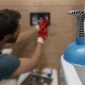 fix leaking toilet cistern